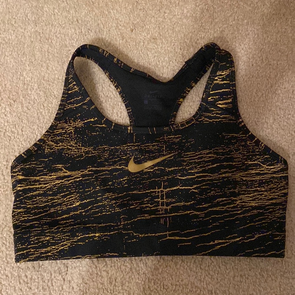 Nike sports bra size large good used condition Gold/Black in color.